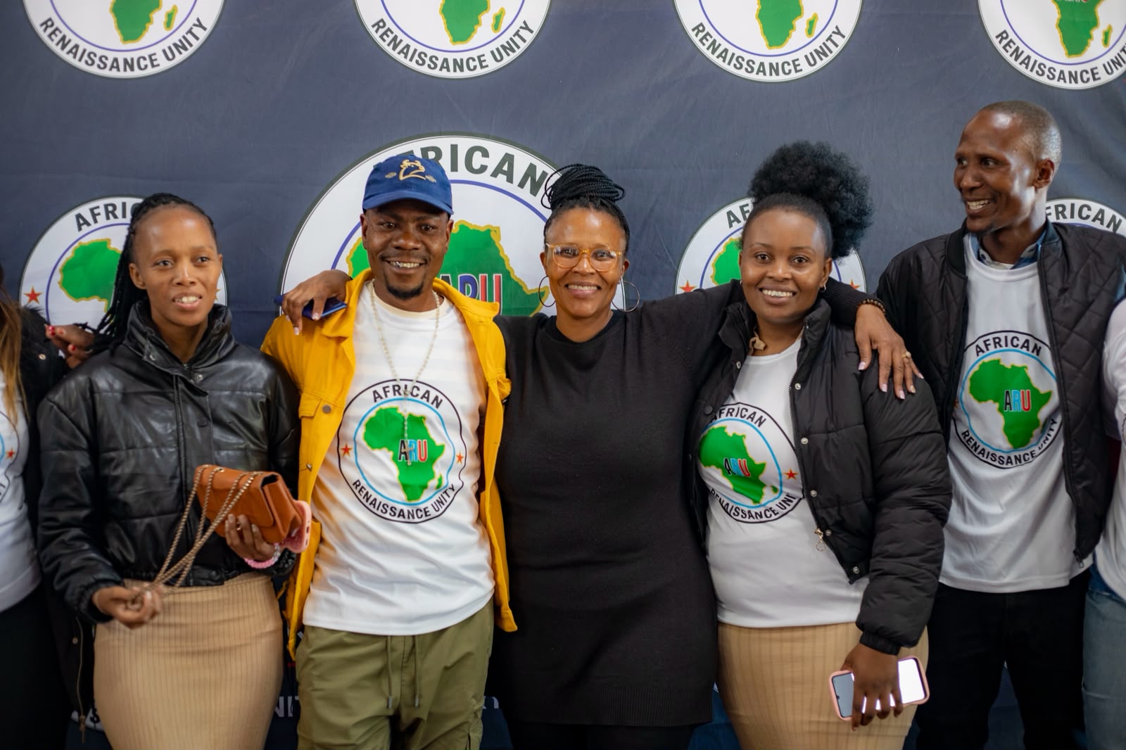 ARU members smiling together at a gathering